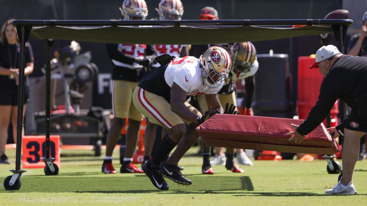 Justin Hilliard running a tackling drill during San Francisco 49ers training camp.